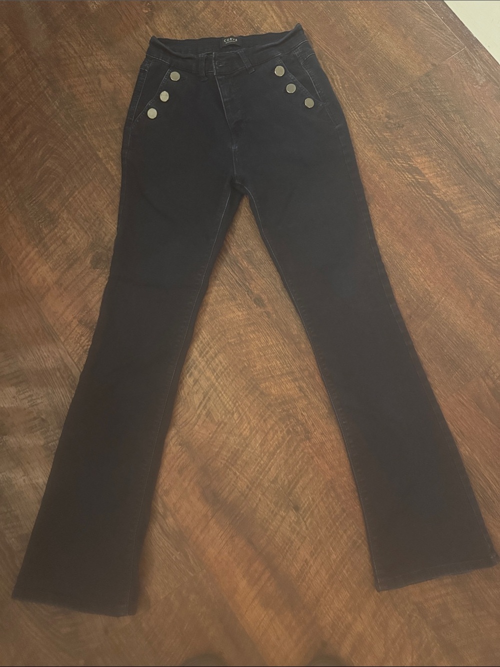 High-Rise Black Flared Jeans with Decorative Buttons